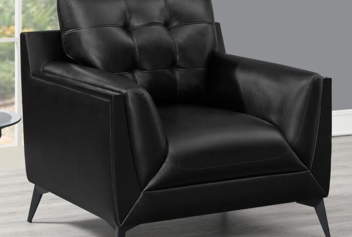 Sleek black breathable leatherette upholstery stands out in this stylish modern accent chair. A bevy of tailored features and construction enhancements transform a conventional seating space into an elegant
