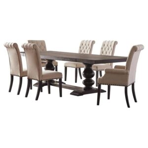 An exceptional dining set is inspired by European decor for a gorgeous dining space. The expansive rectangular tabletop is supported by a dual pedestal base with a stunning silhouette. Find upholstered dining chairs with a rolled backrest design for a traditional chest. The chairs are further enhanced with nailhead trim along with the frame. Supported on tapered legs