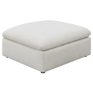 Prop your feet up on the cushioned comfort of this cozy ottoman for the den or living room. Upholstered in linen-like