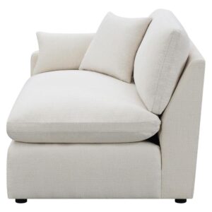 the chair is fashioned with a plush seat and back for long-lasting comfort. It's also crafted with sloped track arms accented with handsome topstitching. The treated fabric easily repels water and moisture so you can wipe up spills before they soak in. It's the perfect end piece to your modular sectional centerpiece.