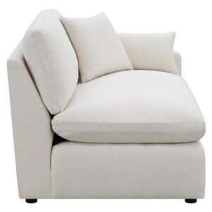 the chair comes with a plush seat and back for enduring comfort. It also has sloped track arms accented by stylish topstitching. The treated fabric easily repels water and moisture so spills won't soak in before you wipe them up. This chair is the perfect end to your modular sectional showpiece.
