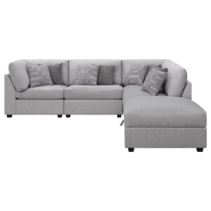 this contemporary modular sectional sofa shows off a clean-lined design complete with a compact profile and understated wedge details that are modern and pleasing to the eye. Soft gray upholstery complements excellent cushioning and support
