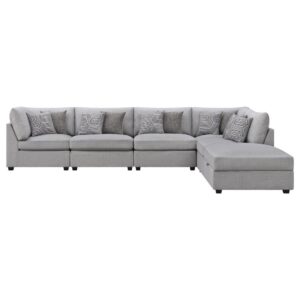 the sectional includes three armless chairs and two corners