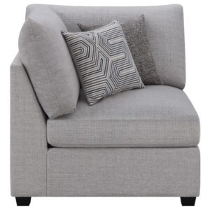 Complete a contemporary motif with the simple silhouette from this modern corner chair. Upholstered in light grey