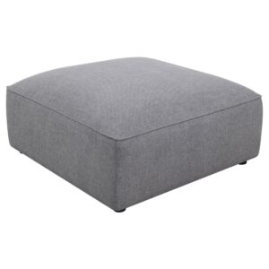 The minimalist design and sophisticated tailored look elevate this contemporary grey ottoman. The large