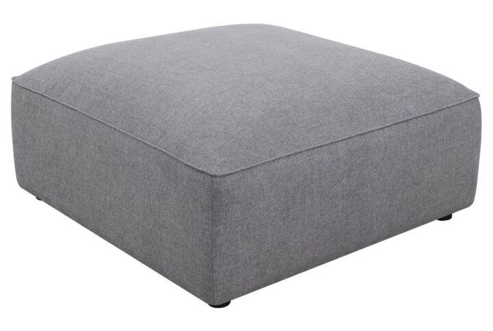 The minimalist design and sophisticated tailored look elevate this contemporary grey ottoman. The large