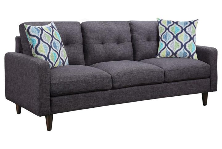 Add a retro twist to a living room with this two-piece living set. With delicate tufting on the back cushions