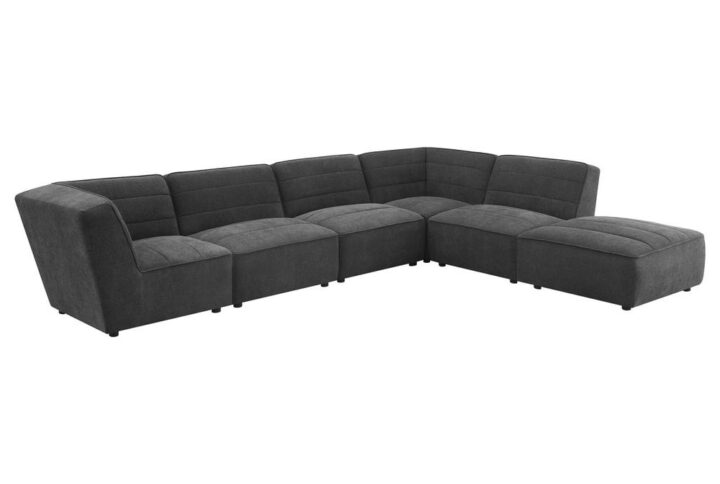 Bring retro-inspired style to your living room with this contemporary modular sectional. The channel tufting and textured fabric create a trendy vibe. The oversized ottoman doubles as a coffee table