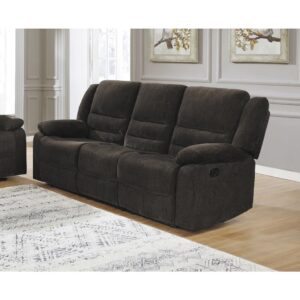 Make guests as comfy as they can be. This motion sofa offers the best of modern engineering and transitional styling. Gorgeous ultra soft chenille in a deep chocolate offers both palette versatility and a dramatic finish. Enjoy triple channeled fiber filled back cushions with extra support and comfort