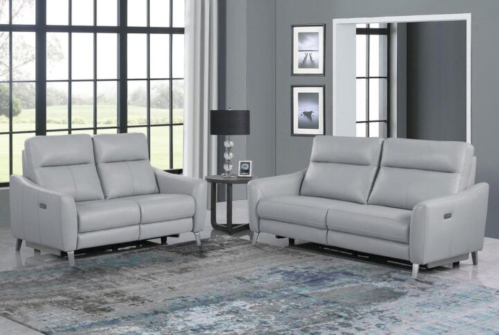 Outfit a modern space with this two-piece power recliner sofa and loveseat. This set is ideal for compact spaces