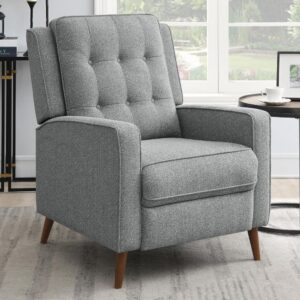 Create a corner retreat with this mid-century modern push back recliner. Designed with a soft gray woven fabric