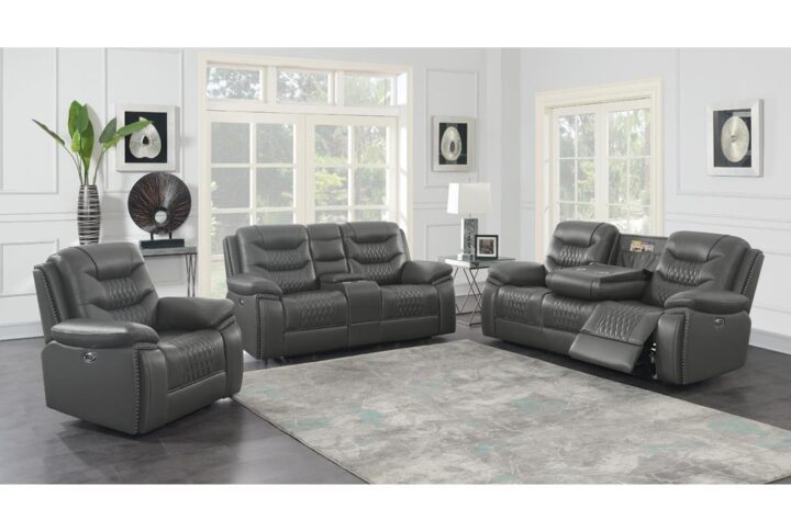 A performance leatherette with a diamond stitched pattern wraps around each piece of this power sofa set
