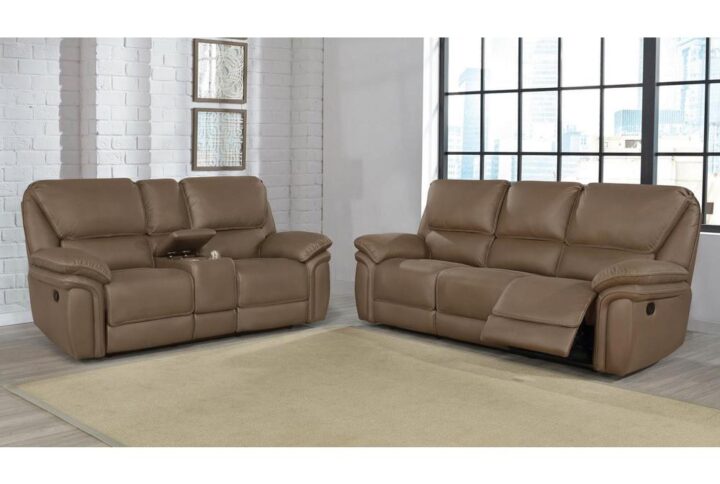 A motion living room set with console will keep your living space organized with remotes and other small items. Find a lift-top console on the sofa along with built-in drink holders for convenience. Each piece in this set is upholstered in a soft and sleek microfiber coming in neutral color options to blend with your decor. Manual reclining mechanisms invite you to kick back and watch your favorite flick by yourself or with friends. With high-density foam cushioning and padded armrests