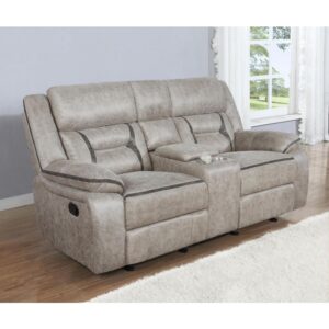 Every entertainment area deserves this glider loveseat with console. The neutral color palette makes it easy to blend with your decor. Its leatherette upholstery ensures a comfortable seating experience. A center console offers a small storage area for remotes with a lift-top container within. Find an easy place to store drinks with the built-in stainless steel cupholders.