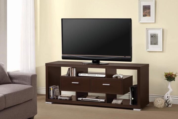 Elevate a living room with the rich hue of this modern TV console. In a cappuccino finish
