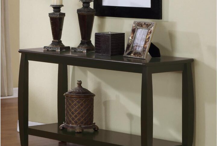 Add a touch of transitional glamour to any living space. This sleek sofa table fits neatly into small spaces