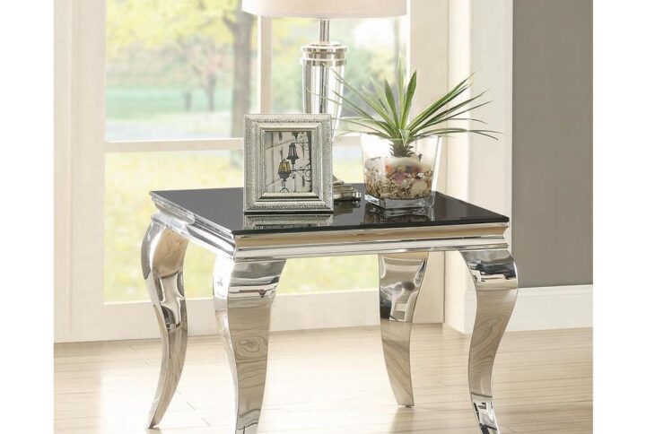 This end table makes a huge impression right from the first glance. It features an eye-catching contemporary design. Table top is black beveled glass that's both timeless and modern. Table legs are fully chromed and tapered with a curved