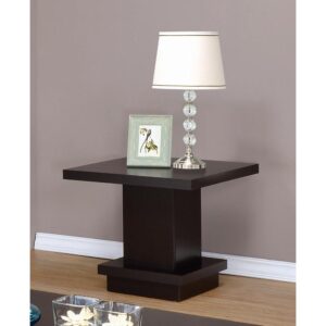 This well-crafted end table has a sleek design that's sure to please. Square table top is roomy enough for a photo and ornamental lamp. The thick stand gives the table an impressive stance. Base comes in a pedestal style design that offers a modicum of shelf space. Rich cappuccino finish adds a warm ambiance to any living room or den.