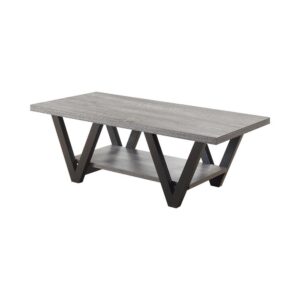 This endearing coffee table has a mid-century modern design that's suitable for any home. The grey rectangular table top is perfect for a vase and candles or even a laptop and tablet. A shelf below is ideal for holding a small fern or decorative basket. The four black finished legs come in a prominent V-shaped design that lends an extra flair to the table. It's got a versatile design and color pattern that matches well with any decor.