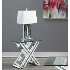 This eye-catching modern glam end table presents a striking X-shaped pedestal base design that adds interest to your living room. Across the dramatically flared X-shaped base is a collection of reflective mirror trim and tile