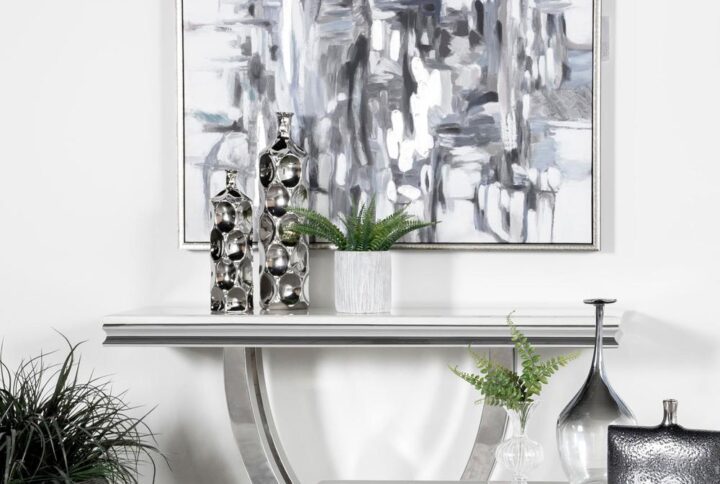 Showcase decor and family photos along this modern glam sofa table. Perfect for your contemporary living room or foyer