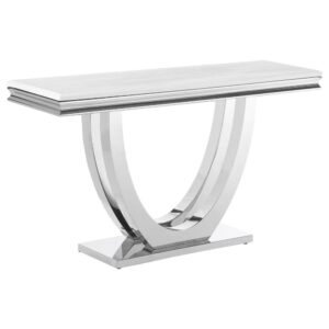 this stylish sofa table presents a white engineered stone table surface for a light