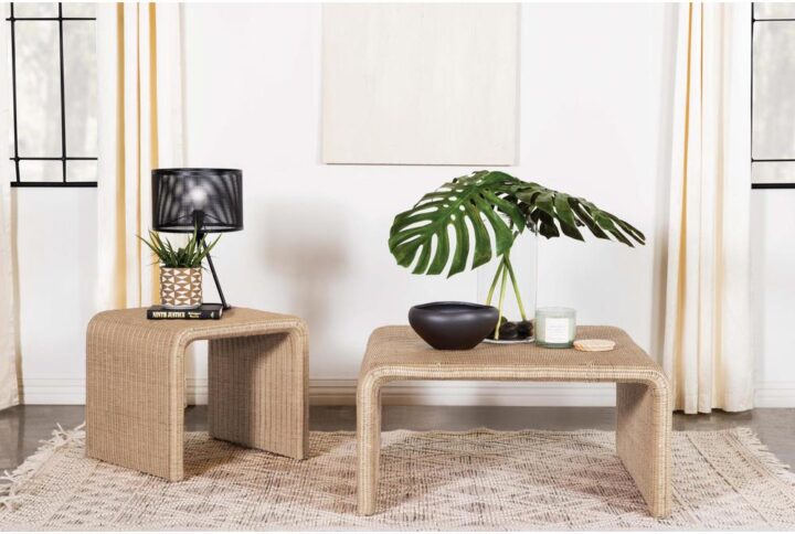 Elevate your boho-inspired living room seating area with this mid-century modern rattan end table