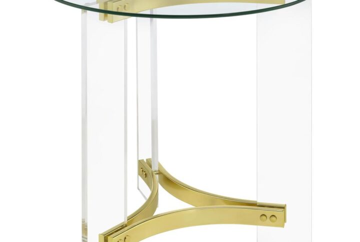 A pair of matte brass braces create simplicity of structure in an engaging contemporary end table. Crafted with three clear acrylic supports