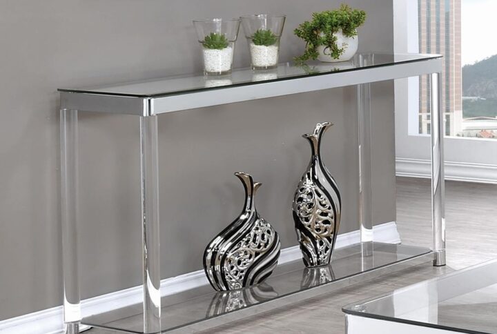 Create an elongated look with the bold metallic details from this clear sofa table. Complete with rounded acrylic legs