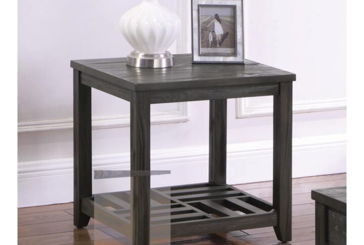 This solid-constructed end table has a simple design that's perfectly suited for any living room decor. Square table top offers space for a table lamp and a decorative vase. Four straight legs with clean lines taper at the bottom. Bottom shelf features a checkerboard design with a perpendicular twist design. Finished in grey with wood grain accents.