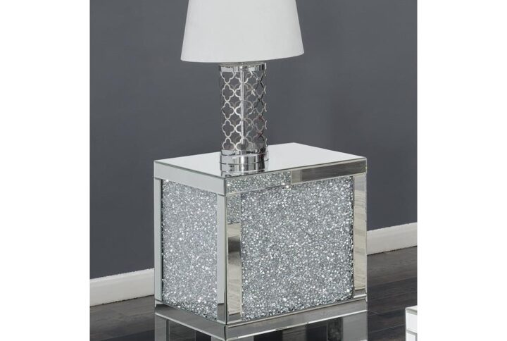 This silver block-style end table will look great in a contemporary style living room. It has clean