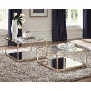 Add this contemporary two-piece occasional table set to your home. Set features both a large and small table that can stand alone or fit beside each other. A rose brass finish frame adds glam and luster to the look. The square table top features crisp