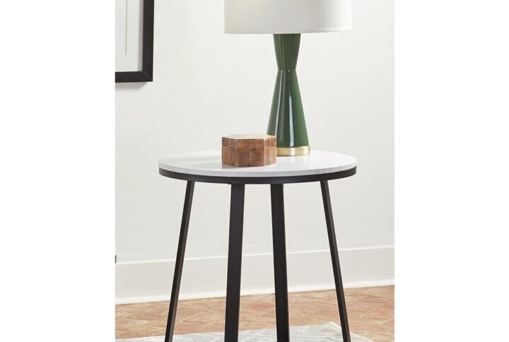 Choose this spectacular end table for its contemporary flair and eye-catching color palette. A matte black metal base is dramatically angled as two U-shape legs intersect. The round tabletop is crafted from a stunning faux marble. With a matte black and white color palette