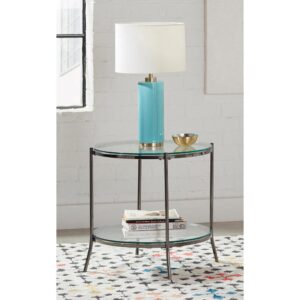 The sleek lines and open and airy design of this end table elevate and refine any seating area. Flanking a sofa or nestled beside an accent chair