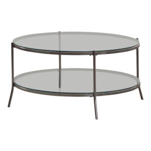 this softly rounded coffee table lends a modern touch with its mixed material design and chic style. Topped with a clear tempered glass tabletop and a bottom shelf