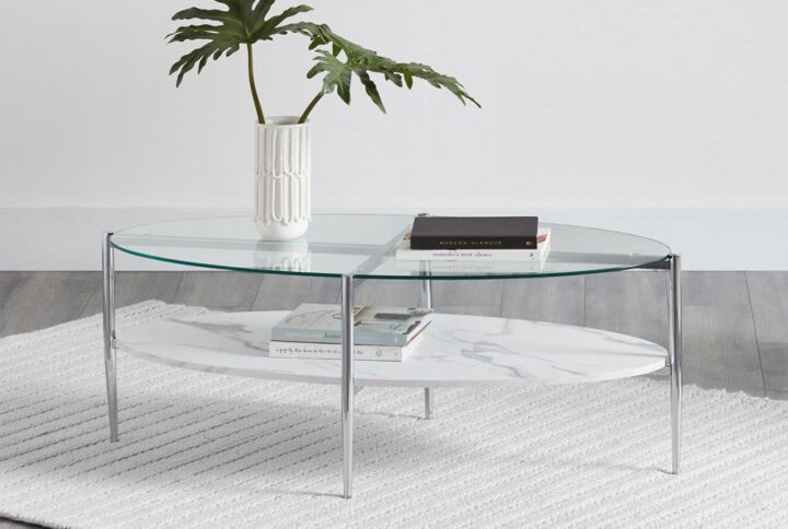Greet every guest with a gorgeous glass coffee table. The sleek metal base is finished in chrome