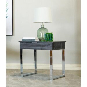 Change up your living space with this modern and rustic end table. A sleek dark charcoal finish is offset by its stunning chrome base. The single drawer is equipped for storing reading materials