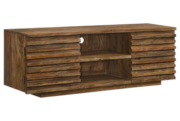 Give your living room a global-inspired feel with this rustic TV console. Designed with solid Sheesham wood that lends gorgeous wood grain details and markings