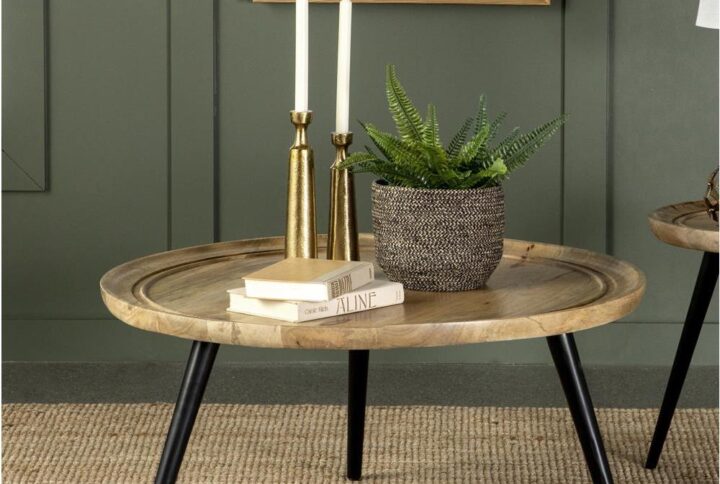 Mid-century designed and rustic elements collide in this contemporary coffee table. Perfect for compact living spaces