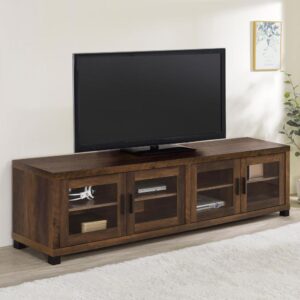 The boxy shape and smooth surfaces of this TV console offer a contemporary look and feel to any space. Double cabinet doors