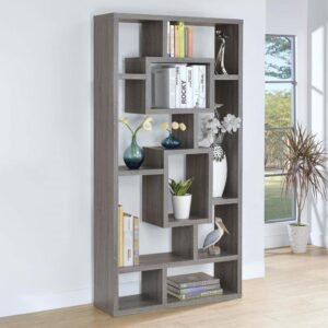 A whimsical silhouette captures attention as it offers essential space for display. This fun bookcase presents a puzzle-like profile with exceptional charm. Ten shelves in a variety of configurations provide plenty of room to show off decor and photographs