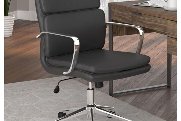 Work in modern comfort and style with this office chair. The sleek styling of the metal frame and arms displays a shiny chrome finish. This cushioned chair features a contoured mid-back design for excellent comfort in a lower profile silhouette. Your new favorite office chair is height adjustable and features casters for easy maneuvering in a busy office space. Supple leatherette upholstery is available in your choice of colors to complement the decor theme of your office.