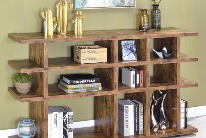 Liven up the look of a living room or home office. This handsome bookcase features a contemporary silhouette with a touch of rustic charm. Nine open shelves of various shapes and sizes provide plenty of room to display an extensive book collection. An antique nutmeg finish infuses its modern design with traditional appeal. Constructed from high-quality materials