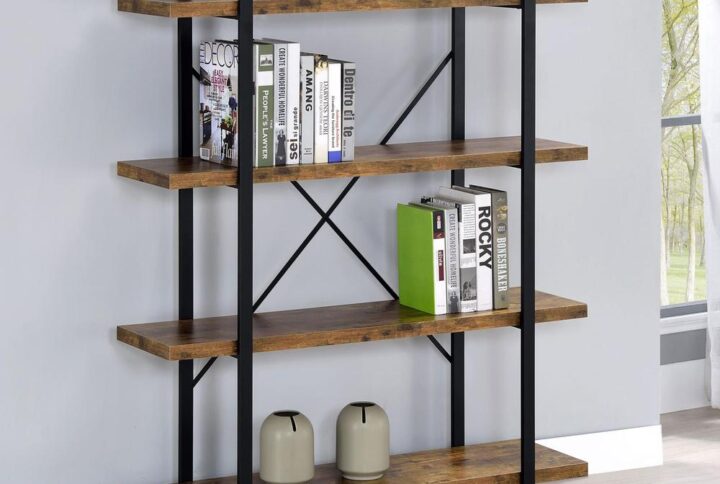 This perfectly rustic style bookcase will soon improve your living area or workspace. Four spacious shelves provide plenty of storage for your book collection. The durable geometric frame provides an open and airy display. The cross back design provides additional support and aesthetic flair. This four-shelf bookcase is constructed from materials such as steel and engineered veneer.
