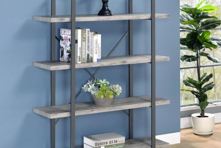 This perfectly rustic style bookcase will soon improve your living area or workspace. Four spacious shelves provide plenty of storage for your book collection. The durable geometric frame provides an open and airy display. The cross back design provides additional support and aesthetic flair. This four-shelf bookcase is constructed from materials such as steel and engineered veneer.