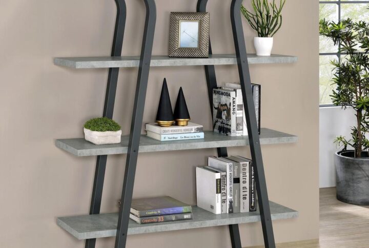 Complete your home office setup with this contemporary bookcase. A cement colored melamine paper enhances the three shelves
