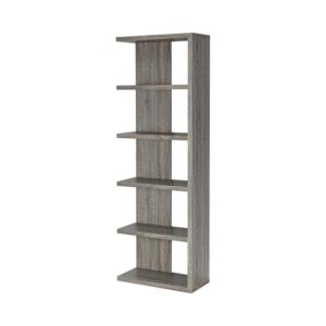 this bookcase offers a pleasing aesthetic and an enticing silhouette. Five tiers of shelving feature a mix of open space and closed backs. Arrange books