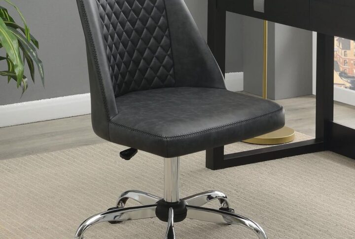 Pull this contemporary accent chair up to a workstation in your home office.Wrapped in a supple leatherette