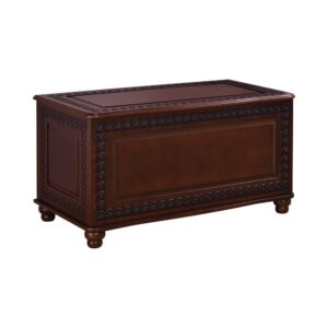 this cedar chest showcases ornate detailing. Lovely deep tobacco offers a sophisticated finish with a touch of warmth. Enjoy the convenience of storage in its inner cavity