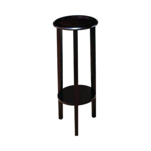 its tri-leg base supports a diminutive circle-shape top perfect for hosting accent decor or leaving as-is. A lower shelf allows for nestling a potted plant. Enjoy a deep espresso finish that defines its sleek profile. This accent table fits nicely in a corner or alongside a seating ensemble.